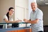 david nash smash repairs customer consulting with receptionist